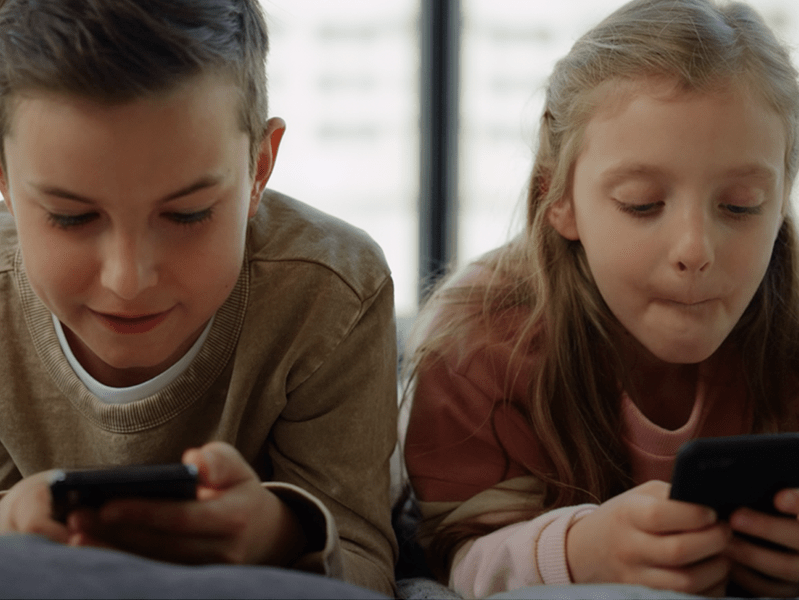 young children on mobile phones