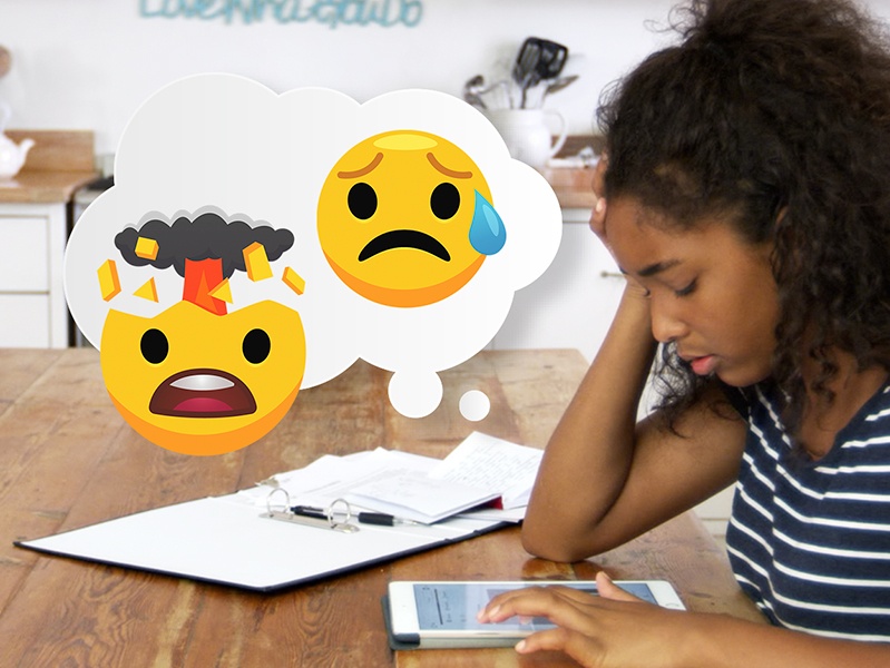 worried young girl looks at phone with sad emojis in a thought bubble