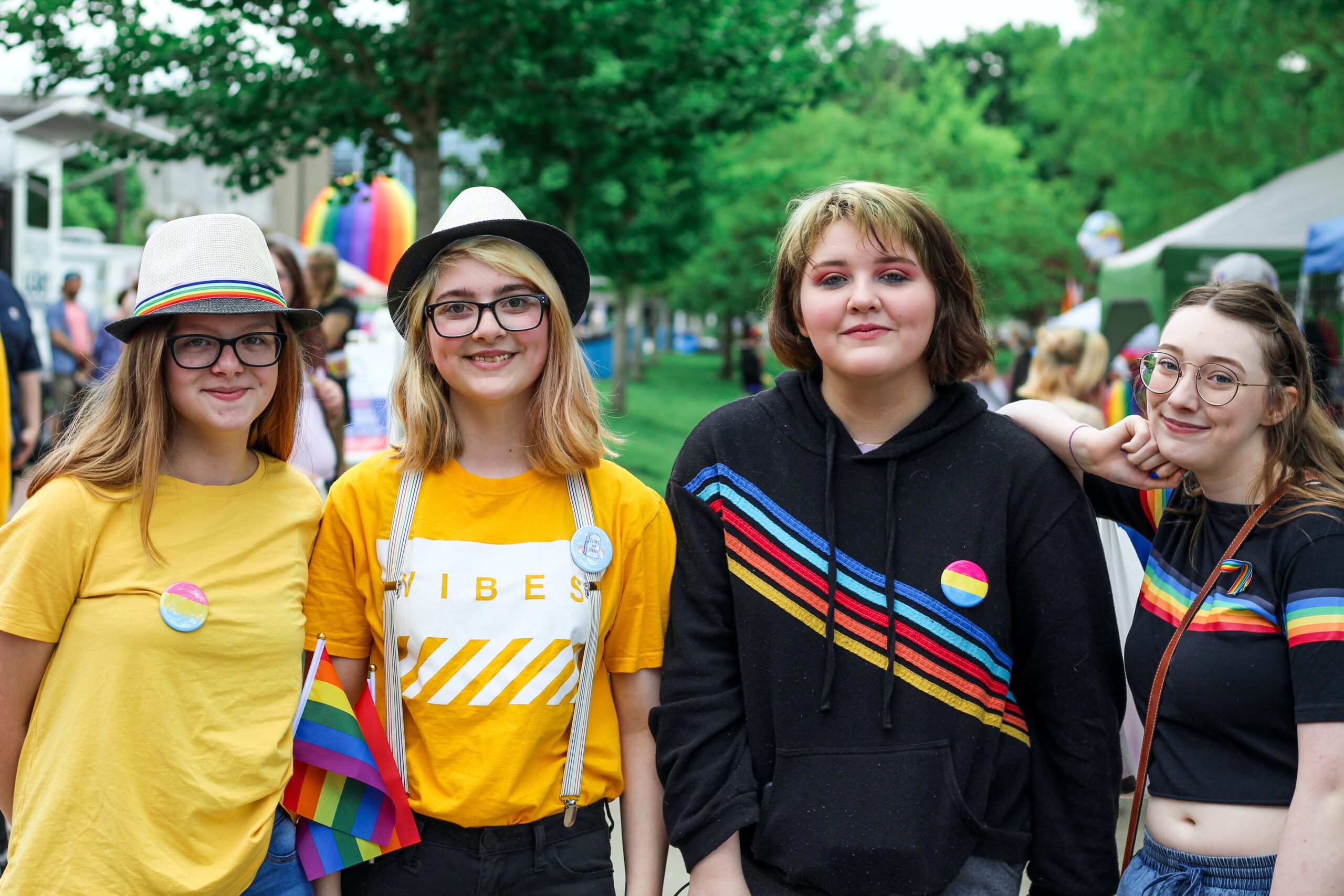 LGBTQ+ young people dressed for pride